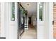 Inviting foyer with hardwood floors and a view of the staircase, creating a warm and welcoming atmosphere at 135 Crimson Rdg, Tyrone, GA 30290