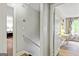 Hallway with stairway and multiple doors at 135 Crimson Rdg, Tyrone, GA 30290
