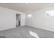 Spacious bedroom featuring plush carpeting and plenty of natural light at 493 Prescott Way, Villa Rica, GA 30180