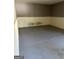 Unfinished basement room features concrete floors and neutral paint at 121 Fountain Oak, Villa Rica, GA 30180