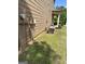 The side of the house showing the air conditioner unit and the electric meter at 121 Fountain Oak, Villa Rica, GA 30180