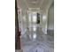 Elegant foyer boasting marble flooring and refined architectural details at 121 Fountain Oak, Villa Rica, GA 30180