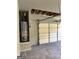 Water heater on the left side with an opened door garage at 121 Fountain Oak, Villa Rica, GA 30180
