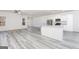 Modern kitchen with stainless steel appliances, island, and ample natural light at 497 Prescott Way, Villa Rica, GA 30180