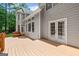 Spacious wooden deck and view of backyard at 120 Oak Shadow Way, Fayetteville, GA 30215