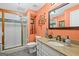 Stylish bathroom with a glass door shower and granite vanity at 120 Oak Shadow Way, Fayetteville, GA 30215