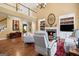 Inviting living room with a fireplace, built-in shelves, and open access to the second floor at 120 Oak Shadow Way, Fayetteville, GA 30215