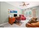 Cozy office with desk, chair, futon, and a door leading to a private deck at 120 Oak Shadow Way, Fayetteville, GA 30215