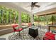 Bright sunroom with ceiling fan, and an outdoor view at 120 Oak Shadow Way, Fayetteville, GA 30215