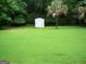 Backyard with a shed at 225 Long Creek Dr, Covington, GA 30016