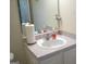 Bathroom sink with white vanity and mirror at 225 Long Creek Dr, Covington, GA 30016