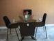 Cozy breakfast nook with a glass table and modern chairs at 225 Long Creek Dr, Covington, GA 30016