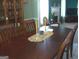 Dining room featuring a table centerpiece and china cabinet at 225 Long Creek Dr, Covington, GA 30016