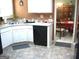 Well-equipped kitchen with white cabinets and modern appliances, ideal for cooking and meal preparation at 225 Long Creek Dr, Covington, GA 30016