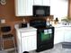 Functional kitchen with stainless steel appliances, offering a practical and efficient cooking space at 225 Long Creek Dr, Covington, GA 30016