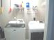 This laundry room features a washing machine and a clothes dryer at 225 Long Creek Dr, Covington, GA 30016