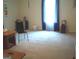 A spacious and bright living room with natural light and neutral decor at 225 Long Creek Dr, Covington, GA 30016