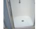 Shower with clear door and white walls at 225 Long Creek Dr, Covington, GA 30016