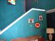 Stairway to the upper level, showcasing the home's interior design and inviting atmosphere at 225 Long Creek Dr, Covington, GA 30016