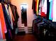 Well-organized walk-in closet featuring clothing racks and storage bins, maximizing storage space at 225 Long Creek Dr, Covington, GA 30016
