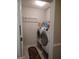 Practical laundry room with washer, dryer, storage and a 'laundry today' sign at 85 Bermuda Run Dr, Covington, GA 30016