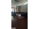 Comfortable living room area with hardwood floors and a large sectional sofa at 85 Bermuda Run Dr, Covington, GA 30016