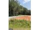 Cleared homesite featuring natural surroundings and gravel road at 380 Ayers Rd, Bowdon, GA 30108