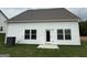 Back exterior featuring white siding, and walk-out patio at 368 Cantrell Drive, Dallas, GA 30157