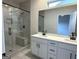 Modern bathroom with double vanity, and glass enclosed shower at 368 Cantrell Drive, Dallas, GA 30157