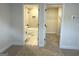 Hallway view into full bathroom and walk-in closet at 368 Cantrell Drive, Dallas, GA 30157