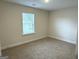 Empty bedroom featuring carpeted floor and single window at 368 Cantrell Drive, Dallas, GA 30157