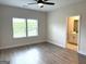 Spacious bedroom featuring hardwood floors and an ensuite bathroom with a double vanity at 368 Cantrell Drive, Dallas, GA 30157
