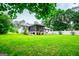 Expansive backyard with a screened-in porch at 65 Pine Haven Ct, Carrollton, GA 30116