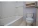 Clean bathroom features a toilet, shower, and storage cabinet at 65 Pine Haven Ct, Carrollton, GA 30116