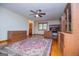 Bedroom with hardwood floors, neutral walls, ceiling fan and natural light at 65 Pine Haven Ct, Carrollton, GA 30116