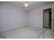 Bedroom featuring soft gray walls, a ceiling fan, and an open door to the bathroom at 65 Pine Haven Ct, Carrollton, GA 30116