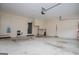 Clean garage featuring ample storage space and access door at 65 Pine Haven Ct, Carrollton, GA 30116