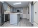 Kitchen featuring stainless steel appliances, eat-in island, and a modern design at 65 Pine Haven Ct, Carrollton, GA 30116