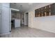 Open kitchen design with grey cabinets, eat in island, with easy access to the laundry room at 65 Pine Haven Ct, Carrollton, GA 30116