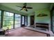 Cozy sunroom featuring natural light and a comfortable seating area at 65 Pine Haven Ct, Carrollton, GA 30116