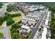 Aerial view of the modern townhome community and tree lined streets, illustrating its layout and location at 2118 Iverson Se Dr, Smyrna, GA 30080