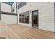 Outdoor patio features a wood deck and door to outside at 2118 Iverson Se Dr, Smyrna, GA 30080