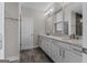 Stylish bathroom featuring double sinks with a vanity and modern fixtures at 2118 Iverson Se Dr, Smyrna, GA 30080