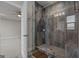 Modern bathroom with a sleek glass door shower showcasing custom tile work at 2118 Iverson Se Dr, Smyrna, GA 30080