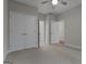 Carpeted bedroom with double-door closet at 2118 Iverson Se Dr, Smyrna, GA 30080