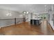 Spacious kitchen with island, stainless appliances, hardwood floors, open to living area at 2118 Iverson Se Dr, Smyrna, GA 30080
