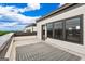 Spacious outdoor patio featuring a patterned rug and views of the surrounding area at 2118 Iverson Se Dr, Smyrna, GA 30080