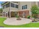 Lovely backyard showcasing the patio with a fire pit and a pergola at 52 Olivia Ct, Palmetto, GA 30268