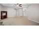 Spacious basement area with neutral carpet, overhead ceiling fan, and versatile layout at 52 Olivia Ct, Palmetto, GA 30268