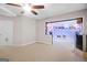 Basement with bar through the doorway and a door at 52 Olivia Ct, Palmetto, GA 30268